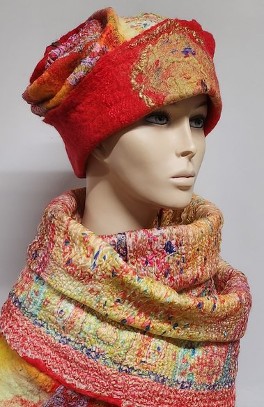oranje hoed en sjaal